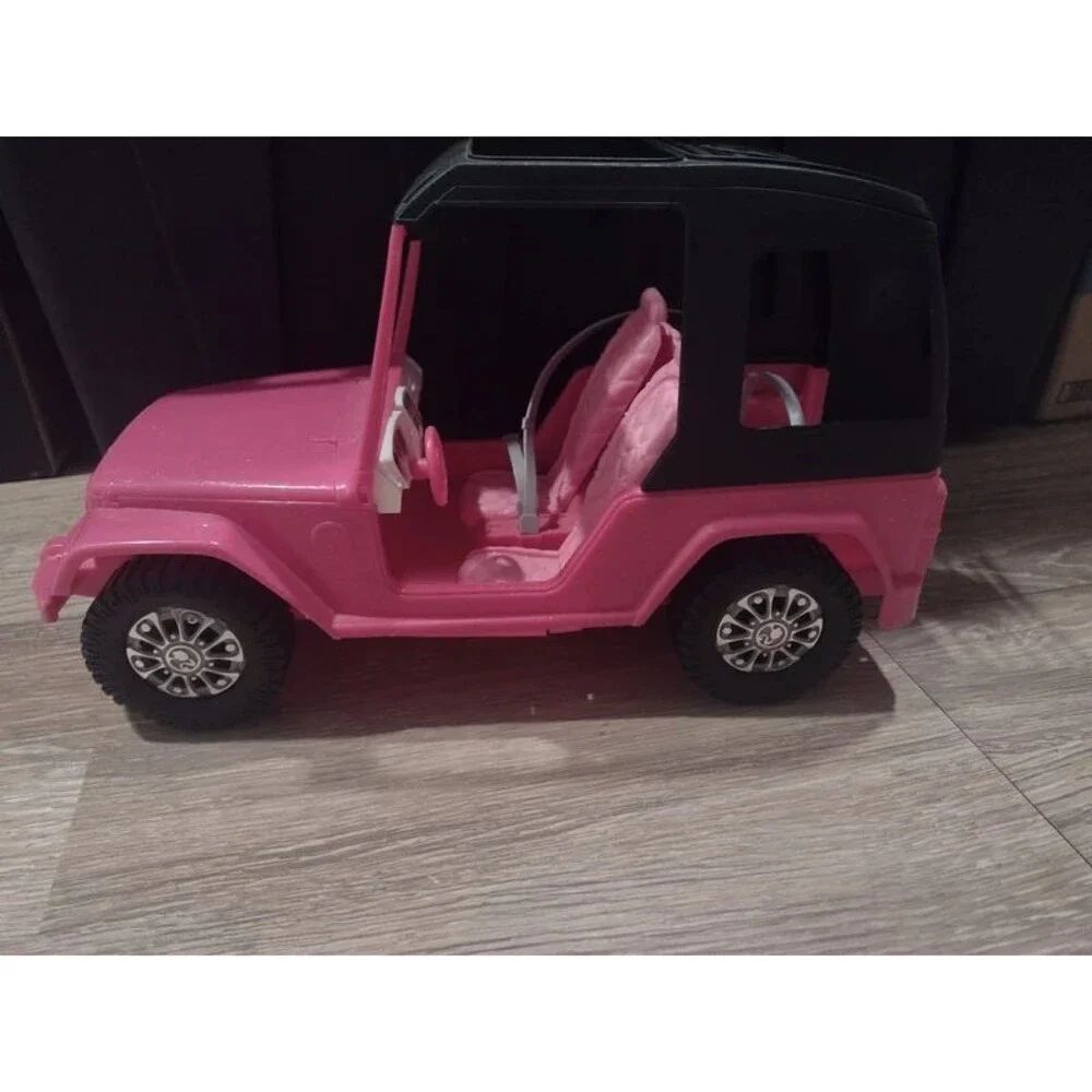Barbie Pink cruiser vehicle in good condition with minor play wear